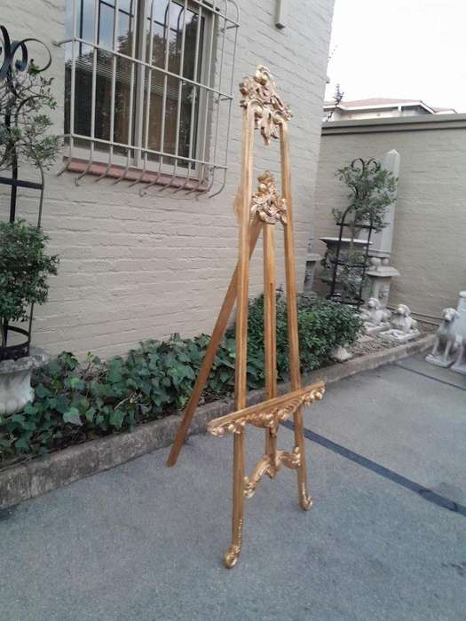 A 20th Century Carved Teak and Hand Gilded Easel