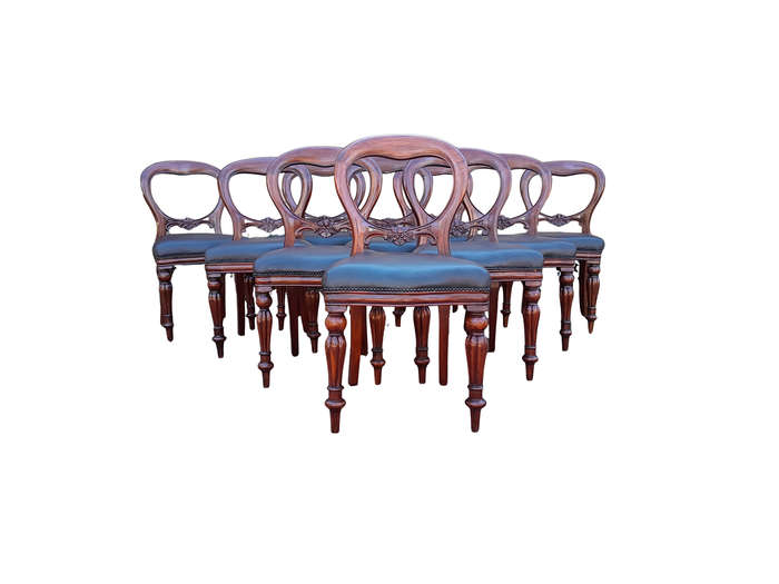An Early 20th Century Victorian Set Of Ten Bustle Back Chairs Upholstered In Deep Button Leather