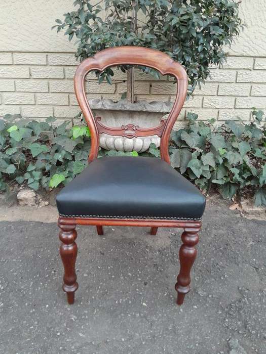 An Antique Set Of Six Victorian Carved Walnut Dining Chairs Upholstered In Leather