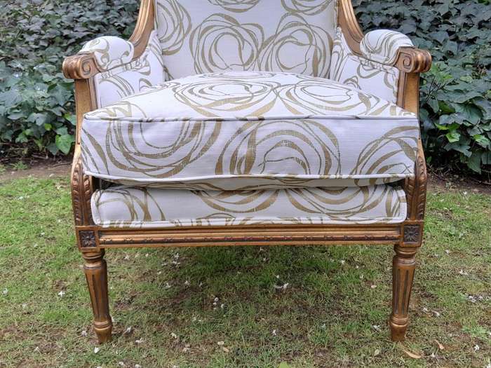 A 20th Century French Style Giltwood Armchairs