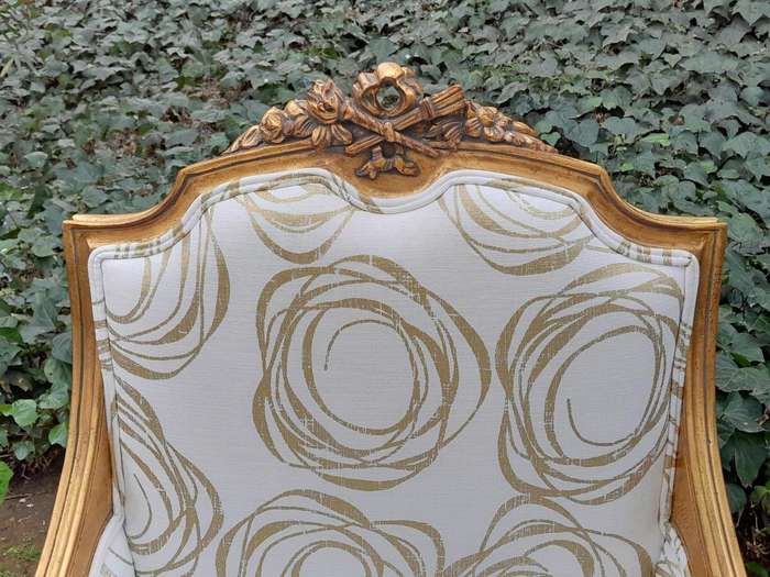 A 20th Century French Style Giltwood Armchairs