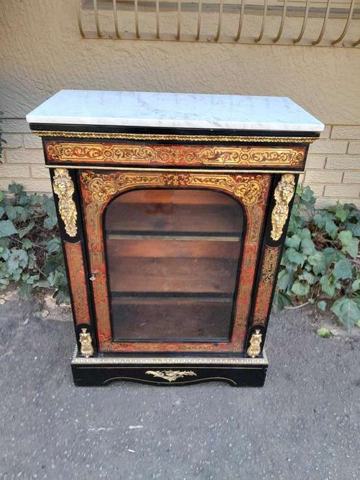 An Antique 19thcentury French Boulle, Ormolu And Ebonised Cabinet
