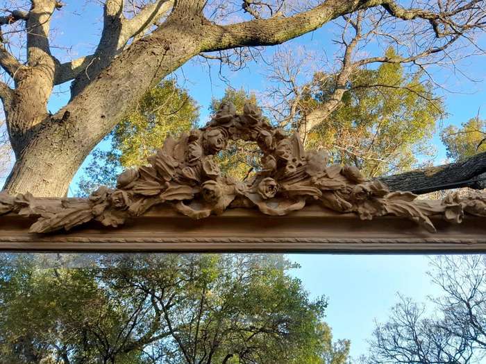 A French Style Ornately Carved Mirror in a Contemporary Finish