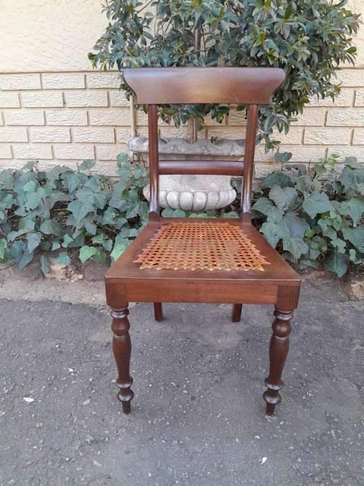 An Antique Set Of Six Cape Stinkwood Regency Chairs With Rattan Seats