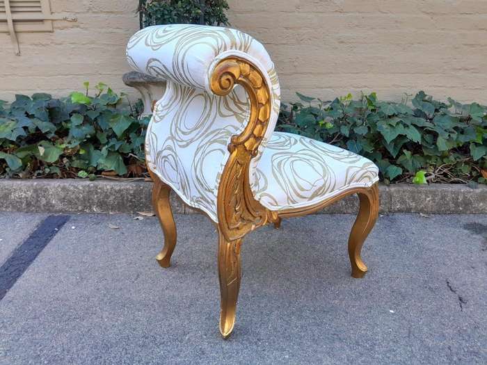 A 20TH Century Carved Giltwood Chair In A Fabric Custom Made For The Crown Collection
