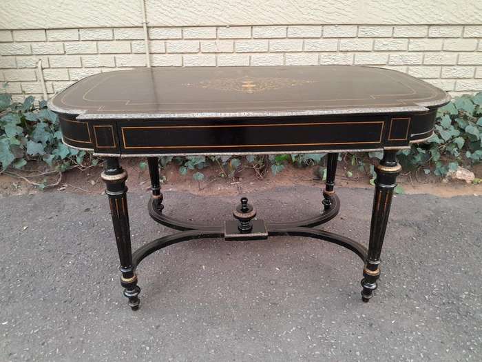 An Antique Victorian Ebonised and with Brass and Mother of Pearl Inlay Table with Drawer
