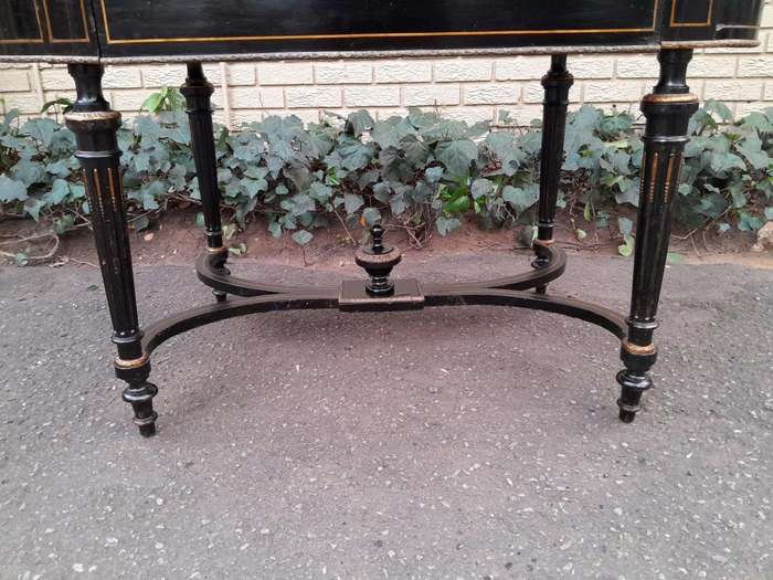 An Antique Victorian Ebonised and with Brass and Mother of Pearl Inlay Table with Drawer