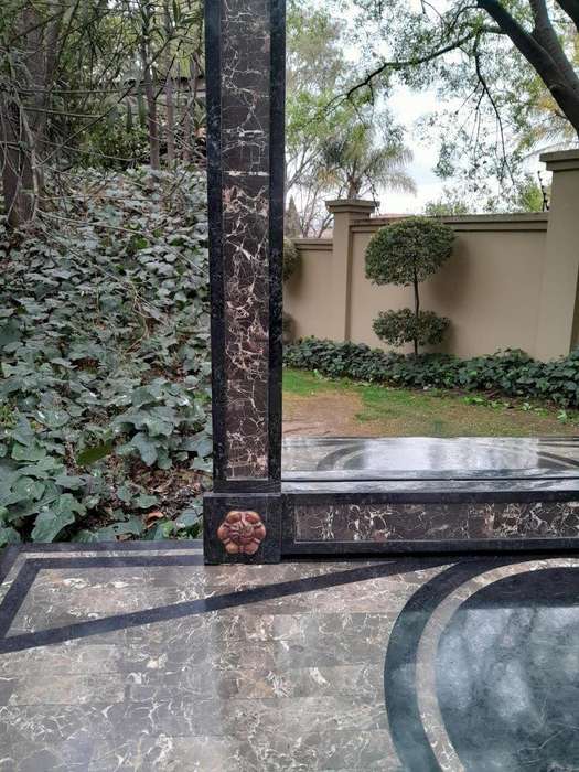 A 20TH Set of Century Maitland Smith Console Table and Mirror with Inlaid Stone Design