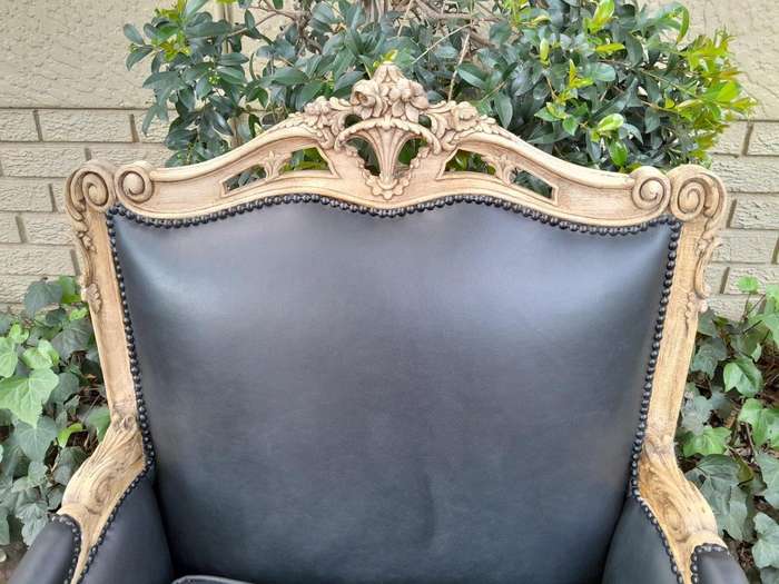 A 20TH Century Pair of French Louis XVI-style Walnut Fauteuils / Armchairs Upholstered in Leather...