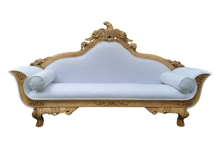 A 20th Century Ornately  Carved Eagle Settee In A Bleached Contemporary Finish Upholstered In A ...