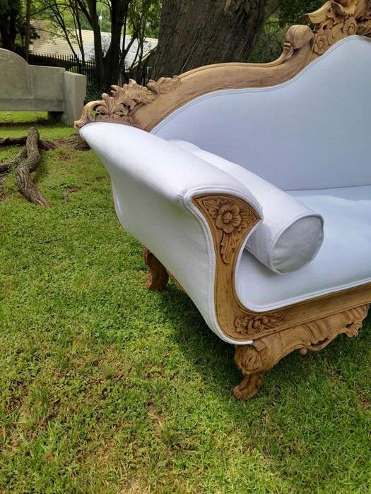 A 20th Century Ornately  Carved Eagle Settee In A Bleached Contemporary Finish Upholstered In A ...