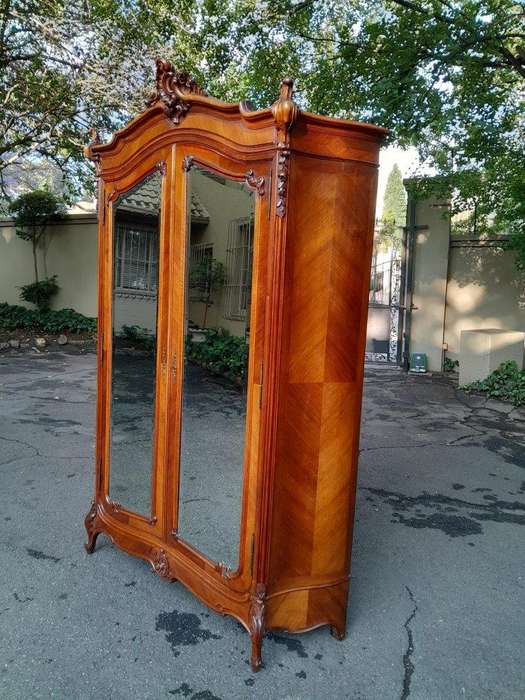 A 20th Century French Louis XV Style Walnut Armoire with Bevelled Mirrors