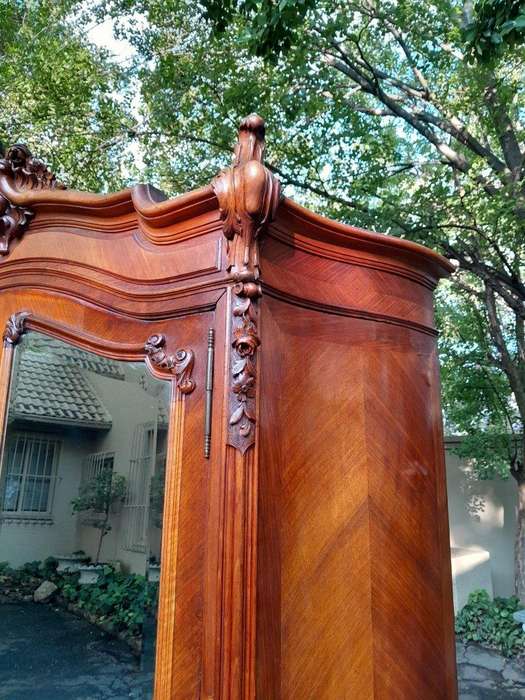 A 20th Century French Louis XV Style Walnut Armoire with Bevelled Mirrors