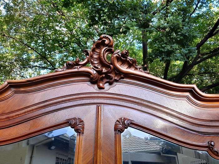A 20th Century French Louis XV Style Walnut Armoire with Bevelled Mirrors