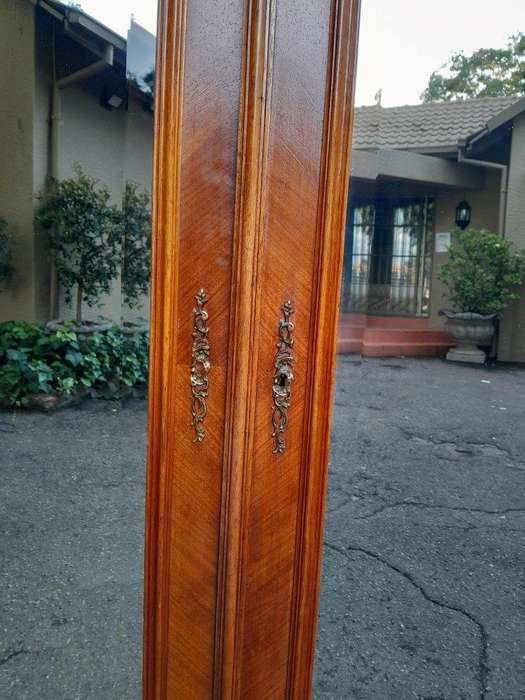A 20th Century French Louis XV Style Walnut Armoire with Bevelled Mirrors