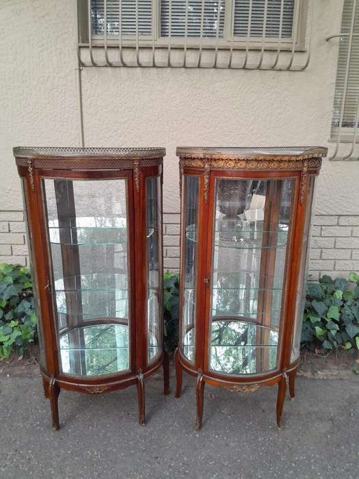 A Rare Near Pair of 20th Century French Style Vitrine / Display Demi Lune Cabinets With Brass Gal...