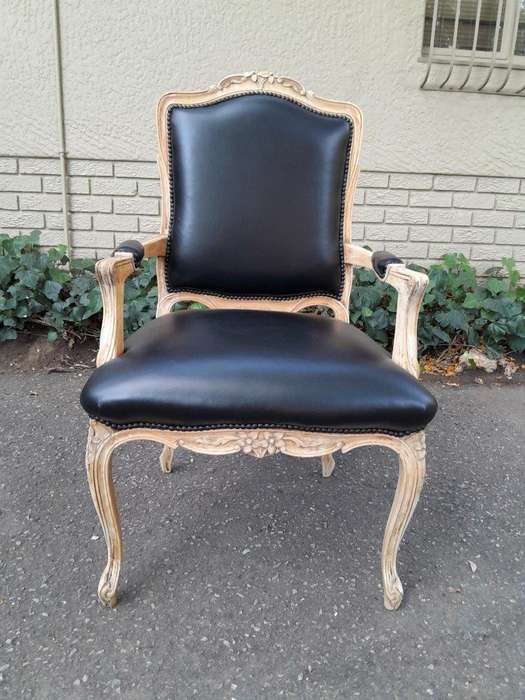 An Antique Pair of Carved Walnut Armchairs