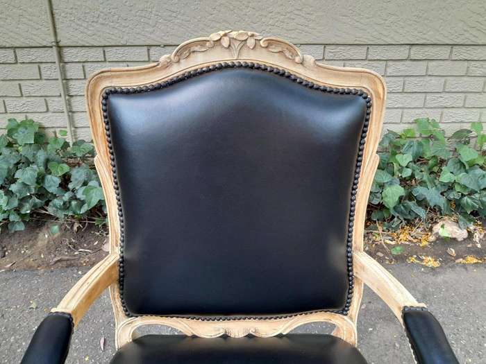 An Antique Pair of Carved Walnut Armchairs