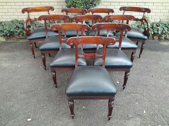A 20th Century Set of Ten (10) William IV Style Mahogany Dining Chairs Consisting a Pair of Carve...