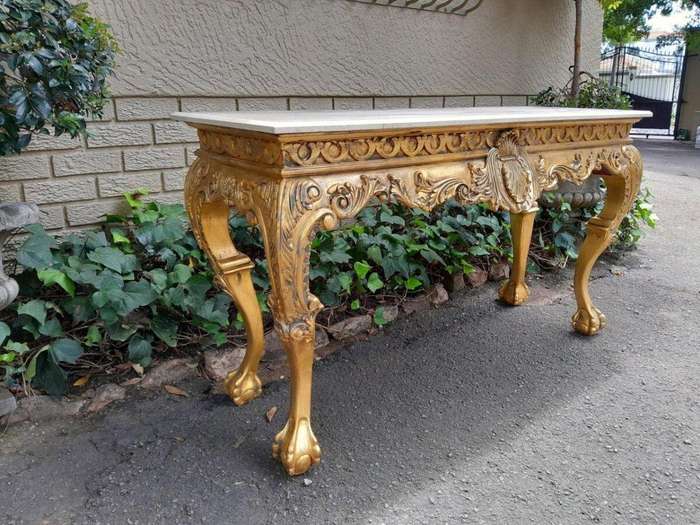 A 20th Century Gilded Console Table with Marble top