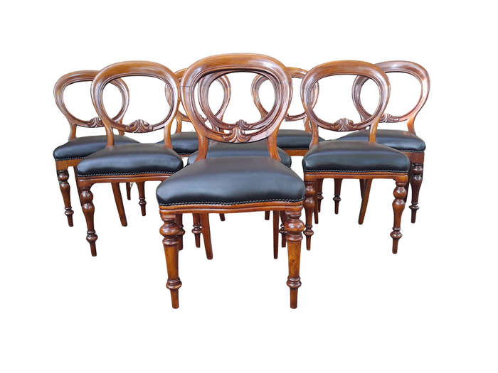 A 20th Century Set of Eight Victorian Style Mahogany Dining Chairs Upholstered in Leather