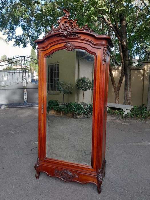 A 20TH Century Circa 1900s French Carved Mahogany Armoire with Bevelled Mirror and Five Shelves