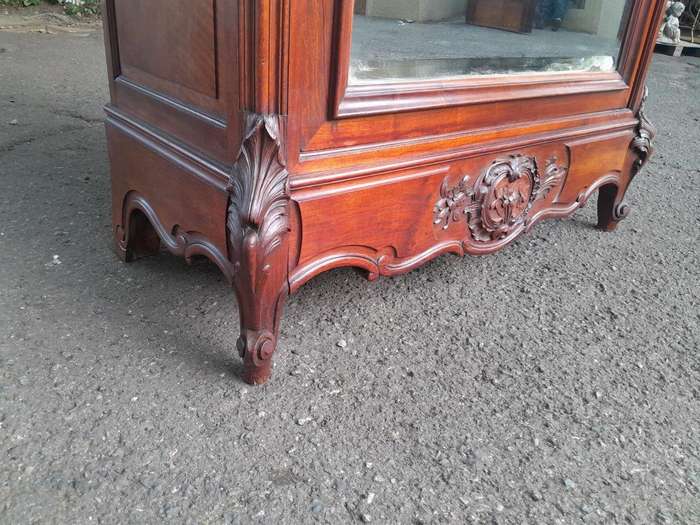 A 20TH Century Circa 1900s French Carved Mahogany Armoire with Bevelled Mirror and Five Shelves