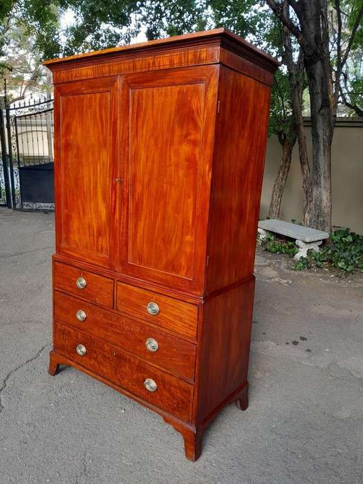 An Antique Circa Victorian Circa 1890s Mahogany Linen Press with Brass Handles  Five Shelves a...