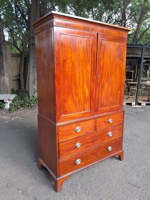 An Antique Circa Victorian Circa 1890s Mahogany Linen Press with Brass Handles  Five Shelves a...