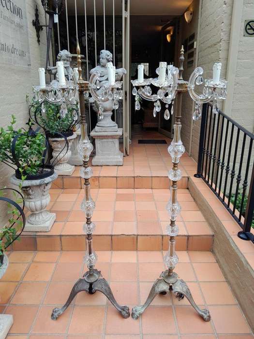 A 20th Century Pair of Crystal and Brass Floor Standing Chandeliers ND
