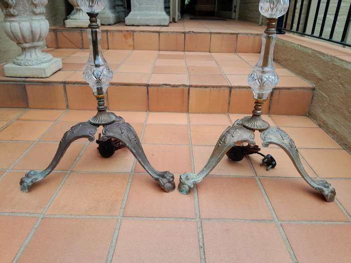 A 20th Century Pair of Crystal and Brass Floor Standing Chandeliers ND