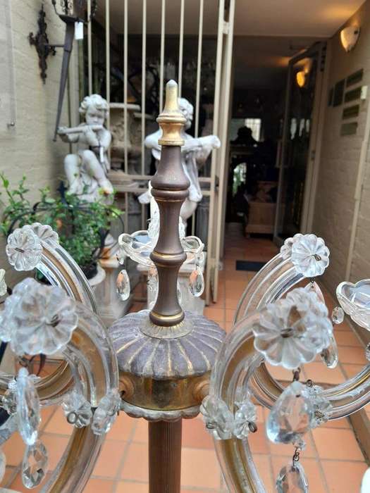 A 20th Century Pair of Crystal and Brass Floor Standing Chandeliers ND