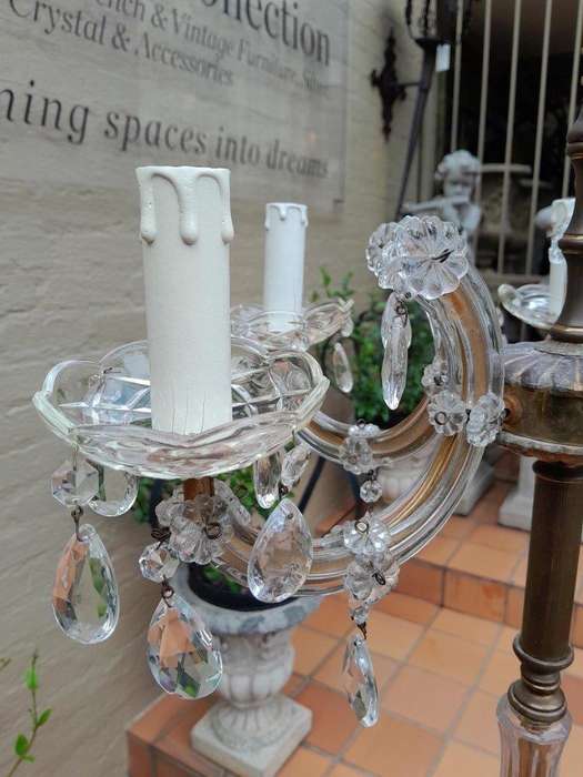 A 20th Century Pair of Crystal and Brass Floor Standing Chandeliers ND