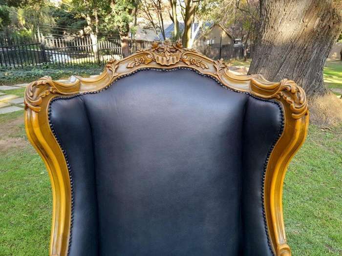 A 20th Century Pair Of French Louis XVI Style Carved Wingback Armchairs