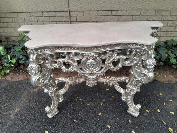 A 20th Century Ornately Carved Gilt Console / Drinks Table With Cream Marble Top