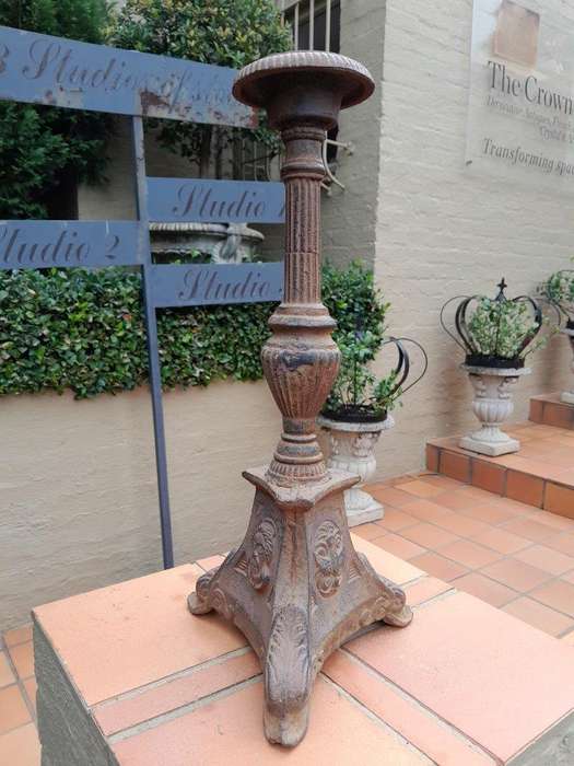A 20th Century French Cast Iron Candle Holder