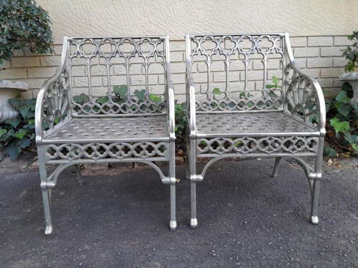 A Pair Of Designer Nickel Armchairs ND