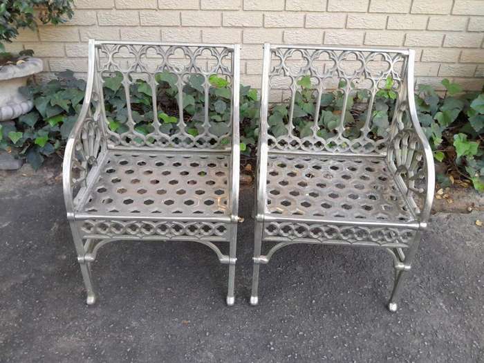 A Pair Of Designer Nickel Armchairs ND