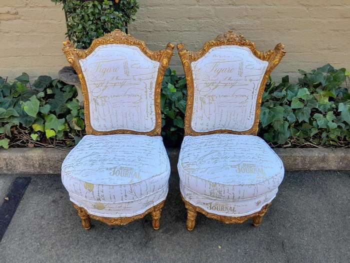 An Antique Early 20th Century French Pair Of Louis XV Style Heavily Carved Gilt Wood Slipper Chairs