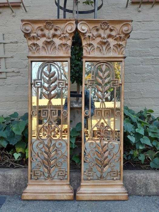 A 20th Century Pair Of Decorative Metal Plaque Style Mirrors
