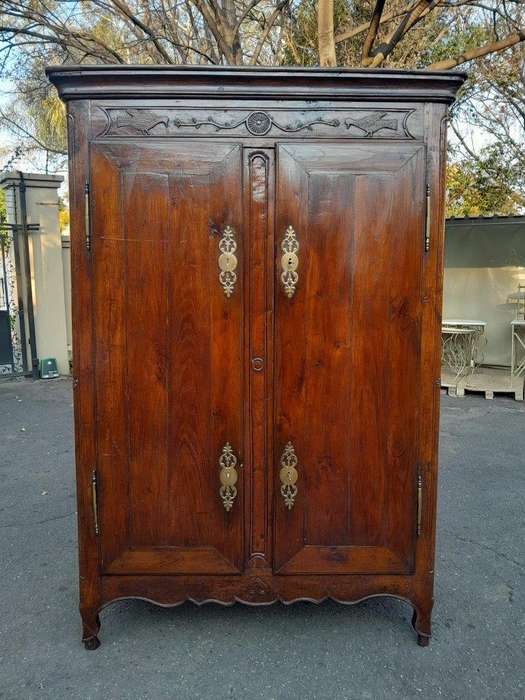 An Antique Early 19th Century French Walnut Armoire With Brass Plates