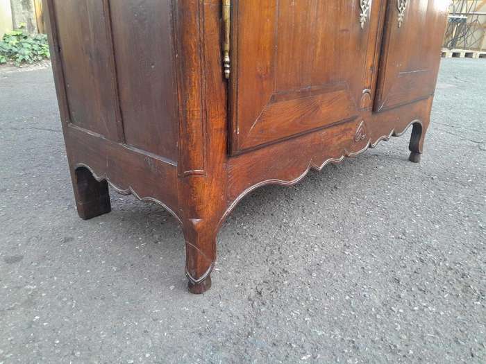 An Antique Early 19th Century French Walnut Armoire With Brass Plates