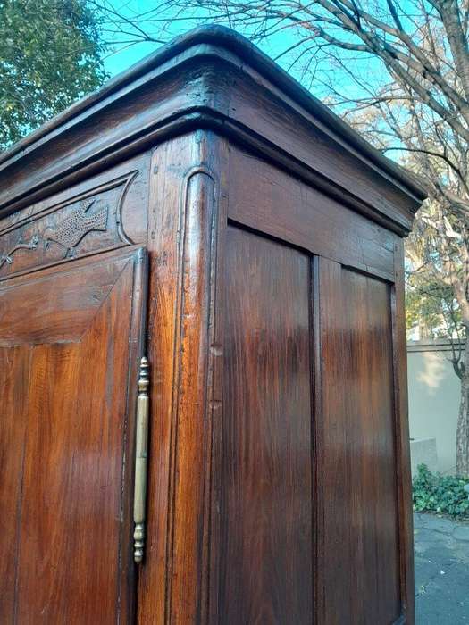An Antique Early 19th Century French Walnut Armoire With Brass Plates