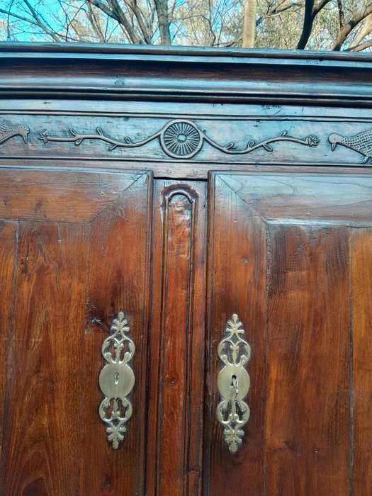 An Antique Early 19th Century French Walnut Armoire With Brass Plates