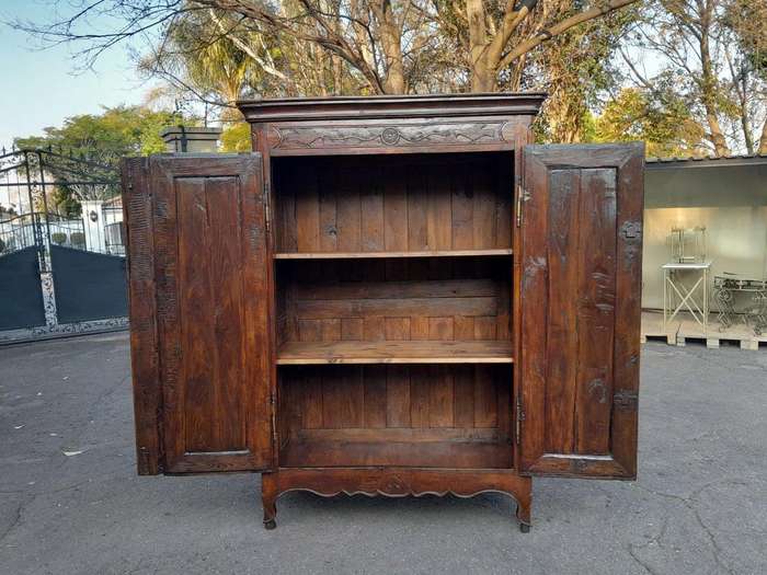 An Antique Early 19th Century French Walnut Armoire With Brass Plates