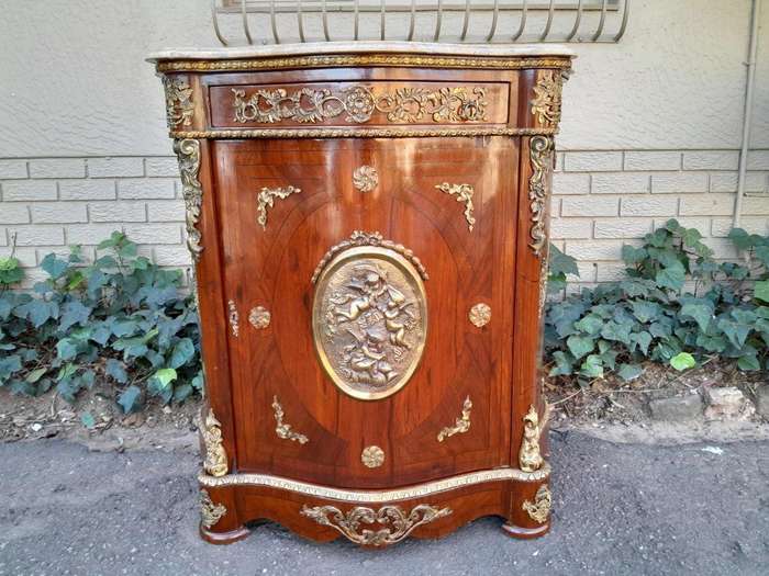 A 20th Century French Louis XV Style Mahogany Credenza With Brass Hardware And Stone Top, Interna...