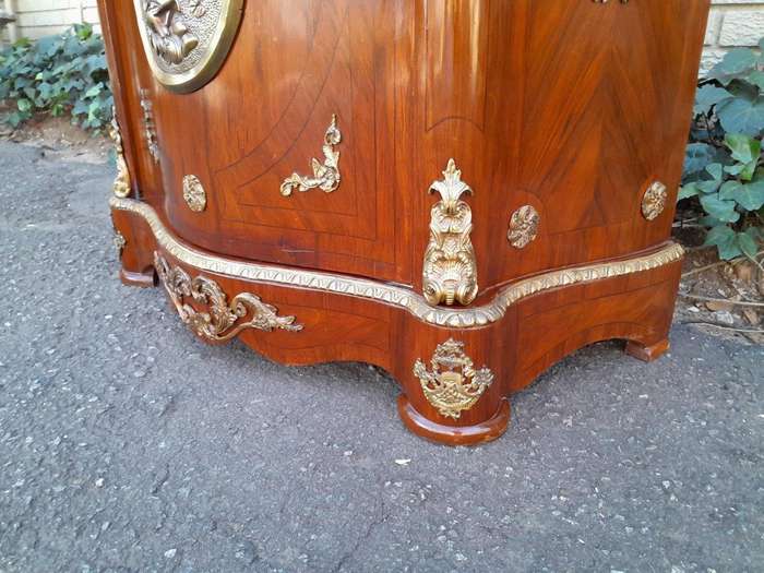A 20th Century French Louis XV Style Mahogany Credenza With Brass Hardware And Stone Top, Interna...