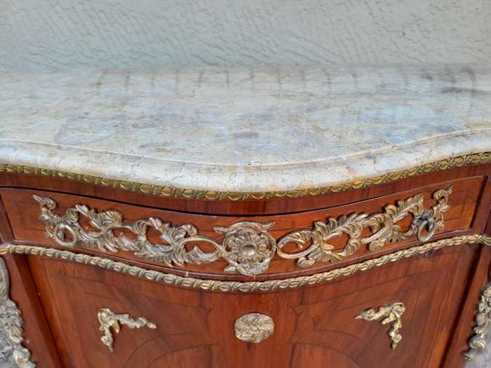 A 20th Century French Louis XV Style Mahogany Credenza With Brass Hardware And Stone Top, Interna...