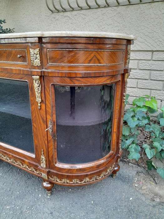 A 20TH Century French Louis XVI Style Rosewood Buffet / Credenza / Drinks Table With Cream Stone Top