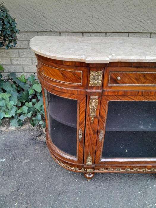 A 20TH Century French Louis XVI Style Rosewood Buffet / Credenza / Drinks Table With Cream Stone Top